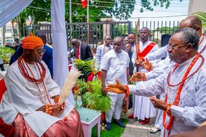 Some Chiefs of Warri Kingdom greeting the Olu of Warri the traditional way